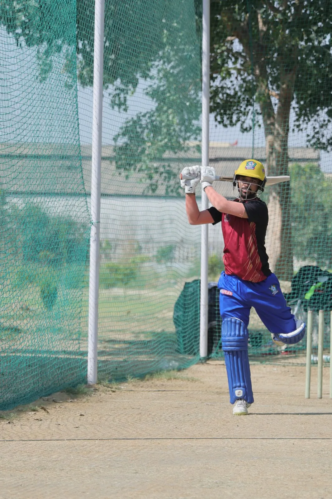 GPL player plays a lofted drive in the practice nets at HLM