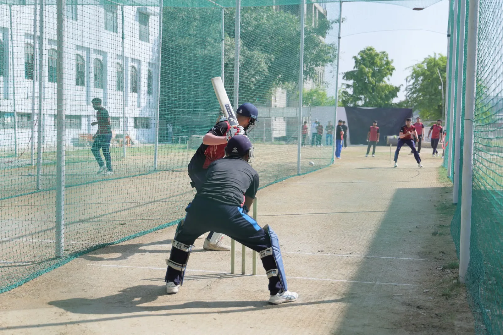 GPL net practice session in progress at the HLM campus cricket ground